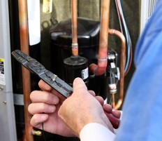 Repairman Servicing HVAC Unit - HVAC Repair Repairman Servicing HVAC Unit - HVAC Repair